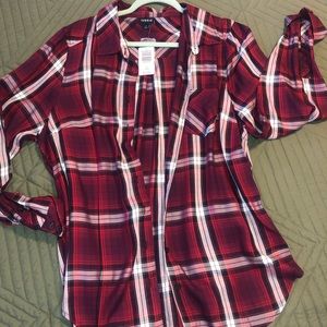 Size 1 Torrid button down. New with tags.